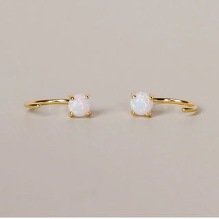 JaxKelly White Opal Huggie Earrings at DLK