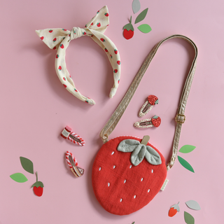 Strawberry print accessories on DLK